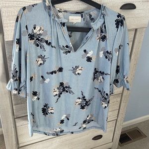 Size Small Melody’s floral print blouse.